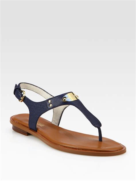 michael kors mk plate thong sandals|MICHAEL Michael Kors Women's MK Plate Flat Thong Sandals.